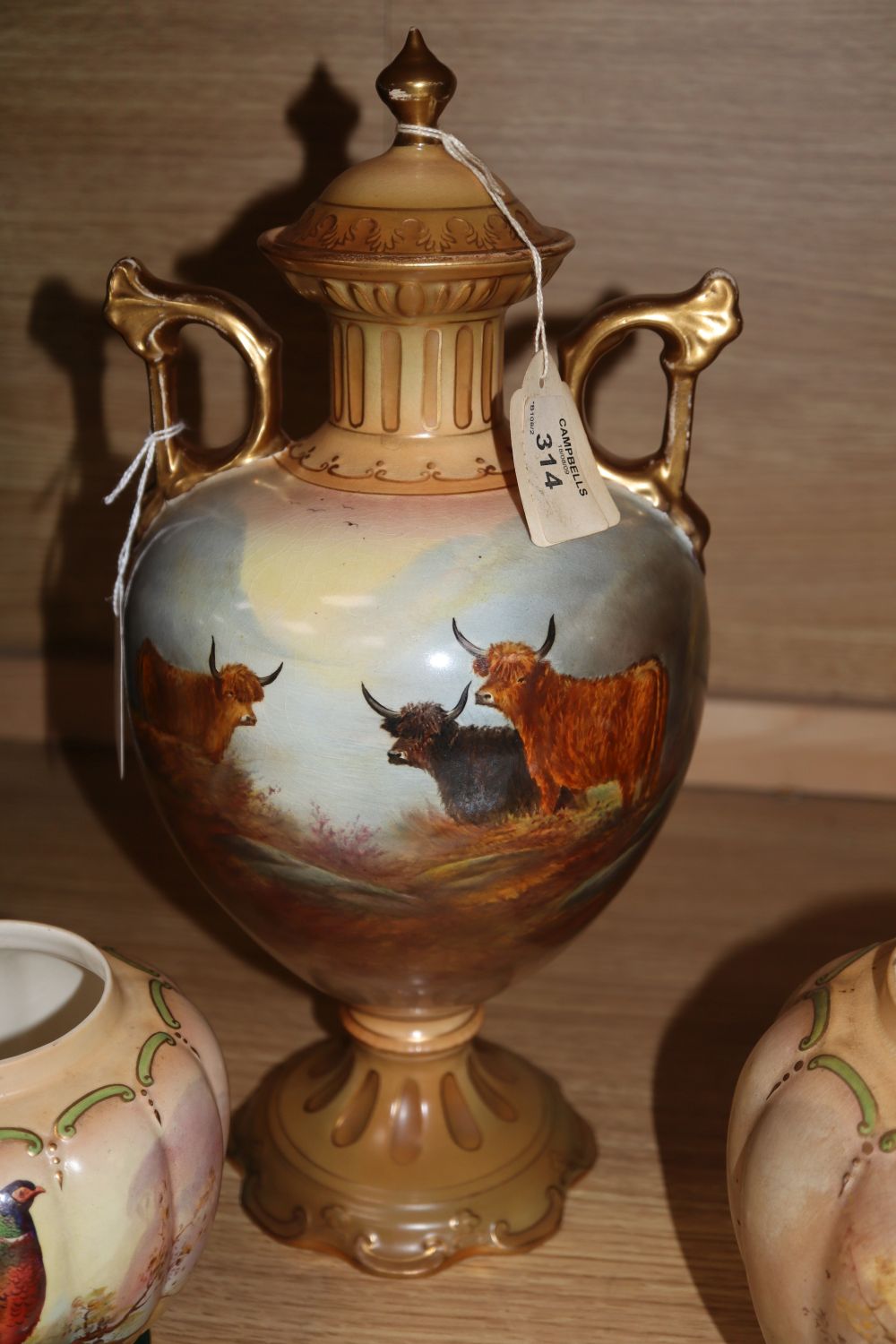 Three Crown Devon vases and a seven Crown Devon fish dishes